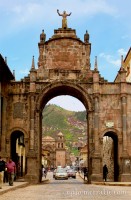 The view to the hills through Arco Santa Clara, Cusco, Peru photo