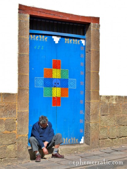 Sleeping it off in a blue doorway, Cusco, Peru