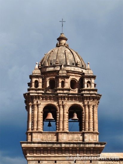 Stormy bell tower of Cathedral Santo Domingo, Cusco, Peru photo