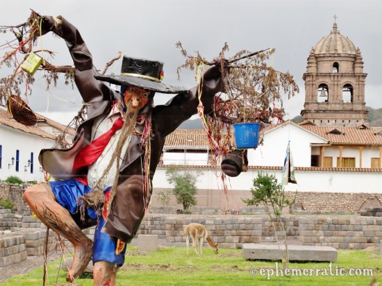 Dancer sculpture and bell tower, Cusco, Peru photo