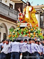 Bearers struggle with the heavy burden of Saint Joseph, Cusco, Peru photo
