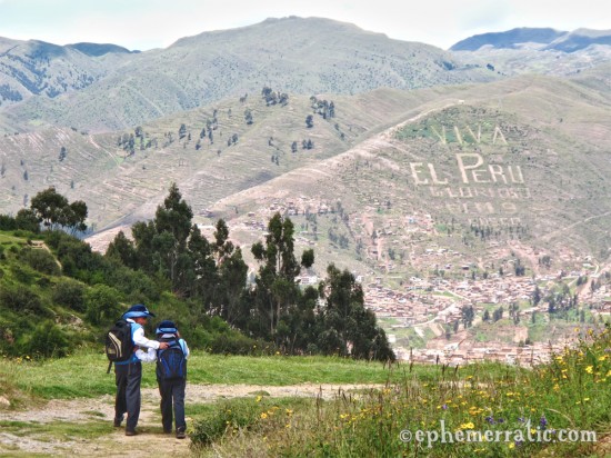 Schoolboys walking together, Cusco, Peru photo