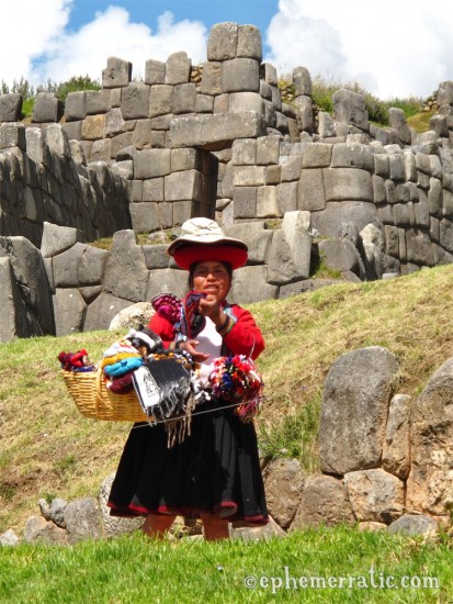 This tout wears many hats, Cusco, Peru photo