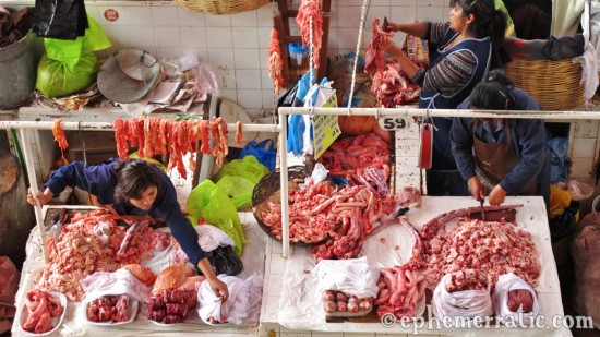 Sorting meats, Mercado San Camilo, Arequipa, Peru photo