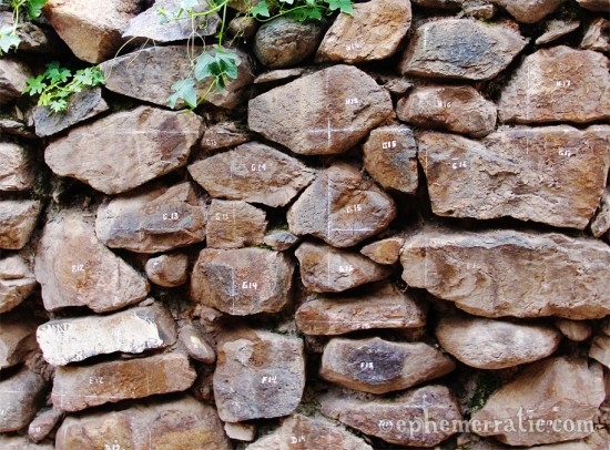 How to build a stone wall, Ollantaytambo, Peru photo
