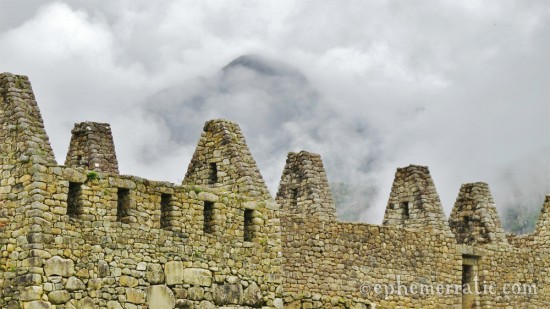 Peaked walls and mountain peak, Machu Picchu, Peru photo
