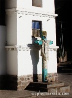 Teal cross in the Sacred Valley, Peru photo