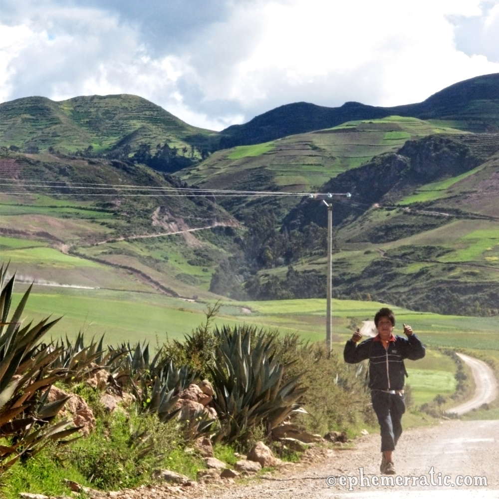 Thumbs up kid, Sacred Valley, Peru photo